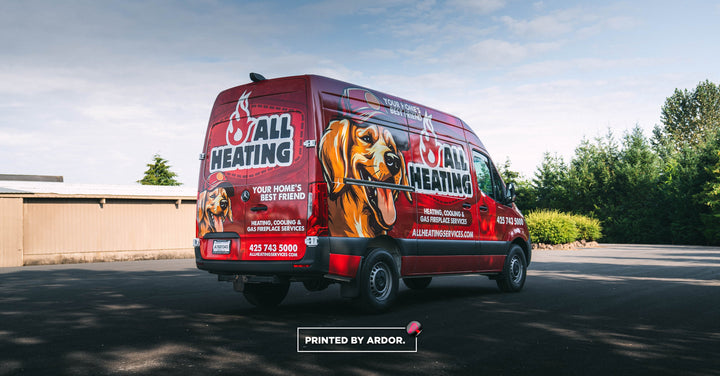 Red Mercedes Sprinter van with an All Heating wrap featuring a golden retriever mascot