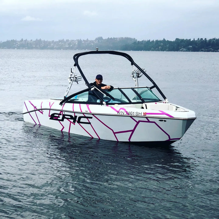 Wake boat with a custom printed vinyl hull wrap installed by Ardor Printing in Washington