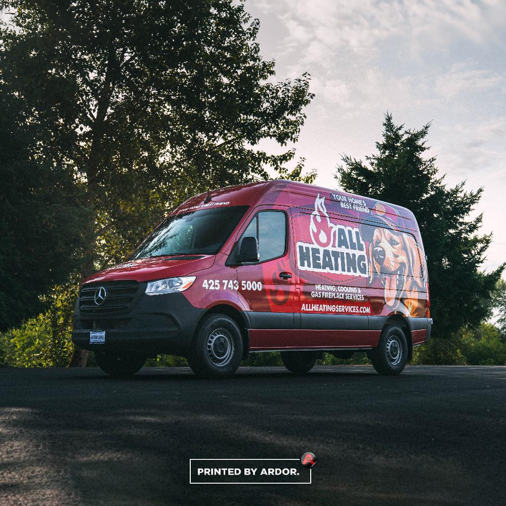 All Heating van wrap with clear logo, playful dog mascot, and bold lettering advertising heating, cooling, and gas fireplace services.