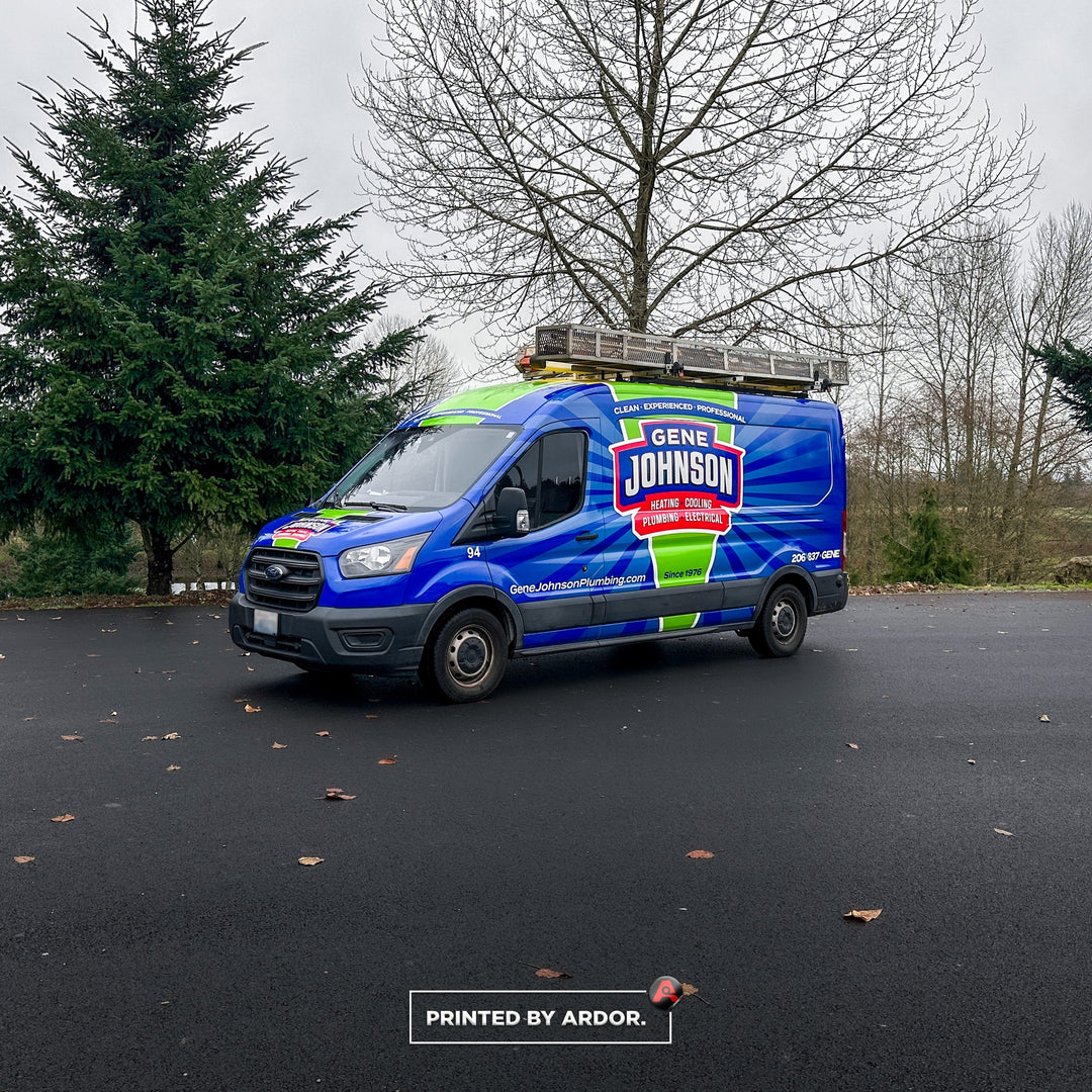 Gene Johnson Plumbing van featuring a custom wrap with blue, green, and red colors, promoting heating, cooling, and electrical services.