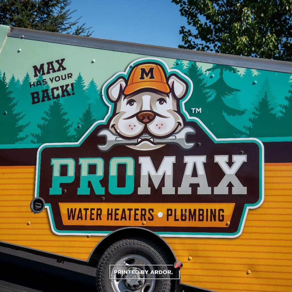 Close-up of the ProMax truck wrap featuring a bulldog mascot with a wrench, promoting water heaters and plumbing services.