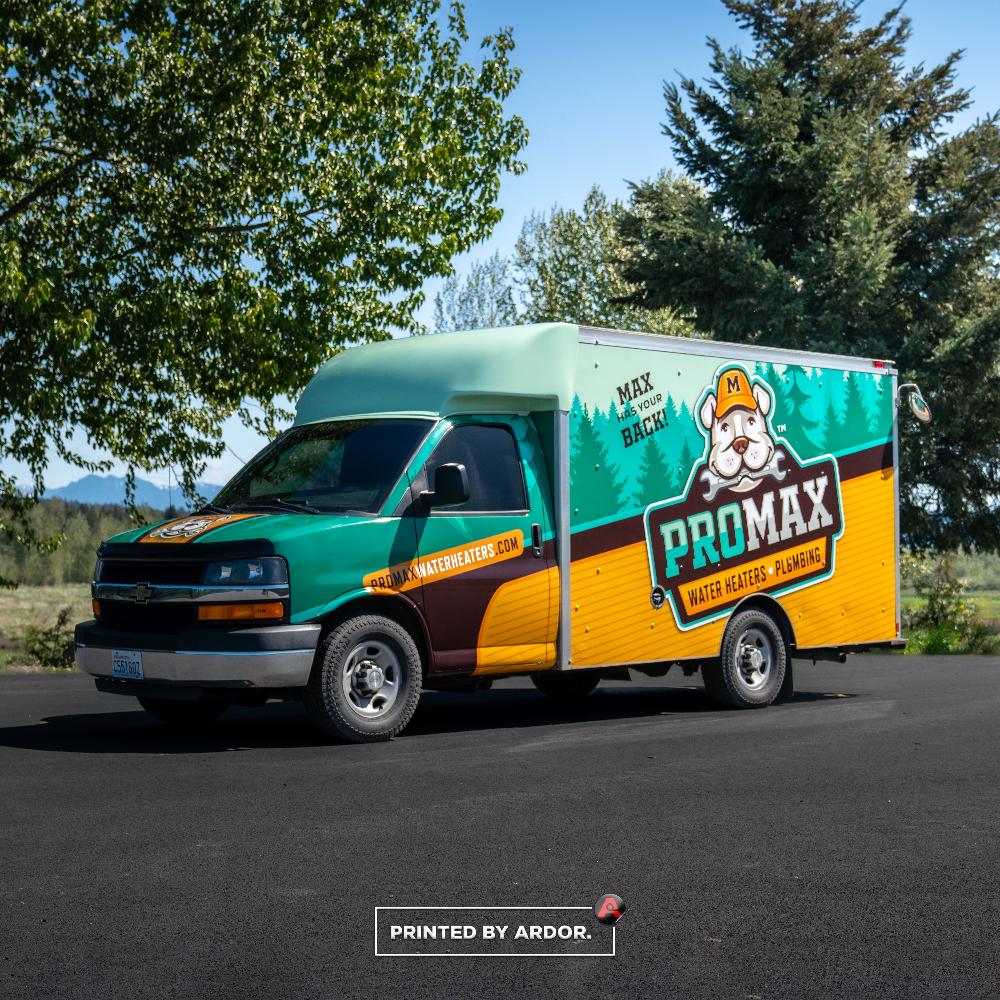 ProMax box truck with vibrant green and yellow wrap, featuring mascot Max, promoting water heaters and plumbing services.