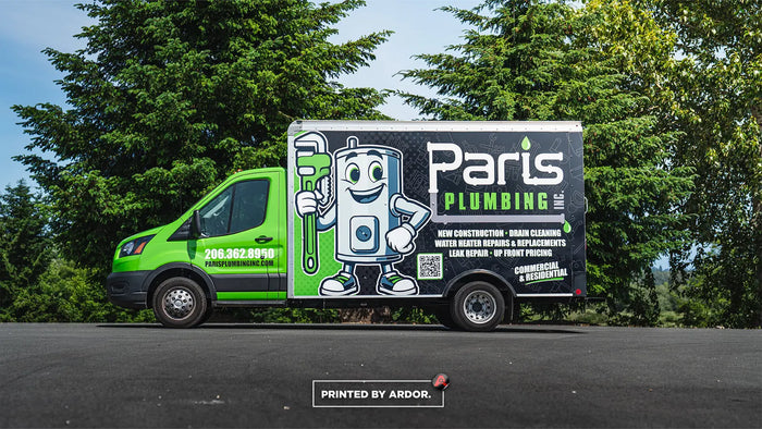 Colorful box truck wrap with mascot for Paris Plumbing