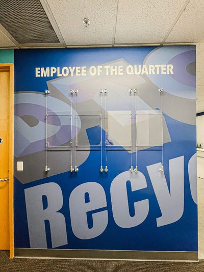 DTG Recycle employee of the quarter wall with acrylic frames by Ardor Printing