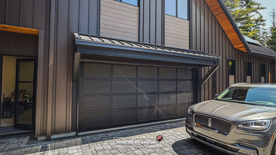 Frosted privacy window film installed on a glass garage door by Ardor Printing