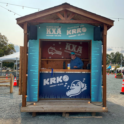 KRKO and KXA radio station event booth covered in custom printed graphics by Ardor Printing, view 5