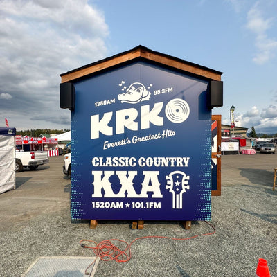 KRKO and KXA radio station event booth covered in custom printed graphics by Ardor Printing, view 7