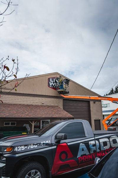 Live Wire Electric building sign installation by Ardor Printing, view 2