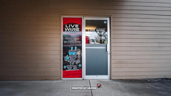 Live Wire Electric storefront door graphics with frosted privacy band by Ardor Printing