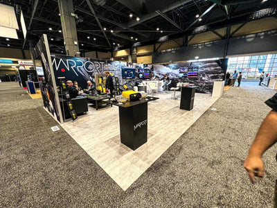 Marport island trade show booth with printed wall graphics and hanging sign by Ardor Printing, view 16