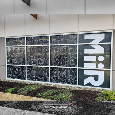MiiR building windows covered with perforated one-way vision window film by Ardor Printing