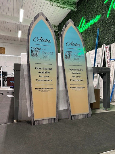Moana Surfrider beach bar surfboard-shaped signs by Ardor Printing
