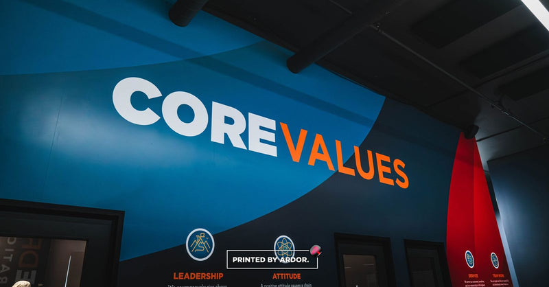 PureDry Restoration office wall wrap with core values and branding by Ardor Printing