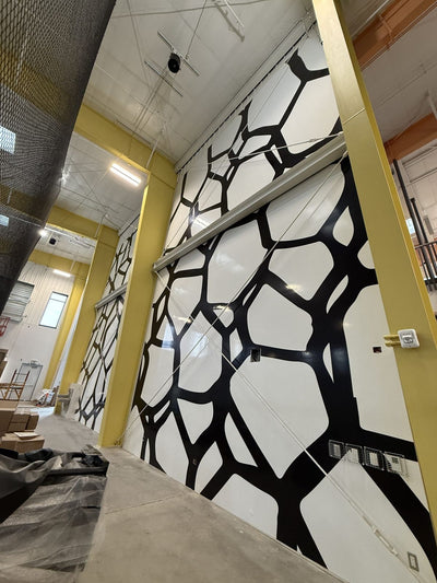 Custom black and red wall graphics in a sports training facility by Ardor Printing, view 3