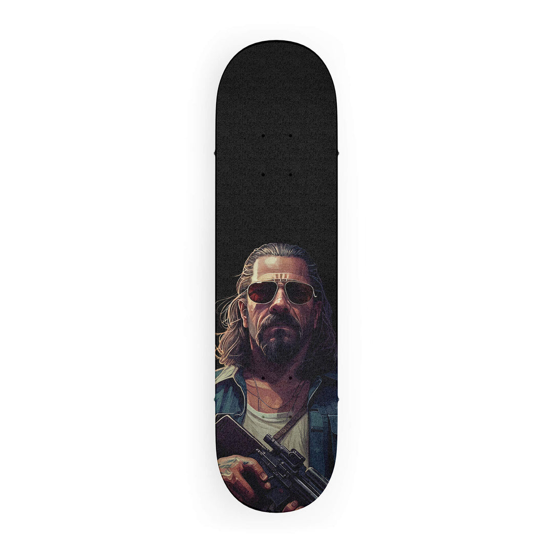 Top-down view of skateboard grip tape featuring The Dude holding a machine gun, with natural lighting colors and a dark mood.