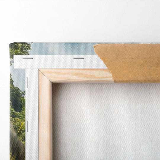 Detailed image of top left corner of canvas, showing folded canvas mounted on 1.5” stretcher bars, Stunning colors of green.