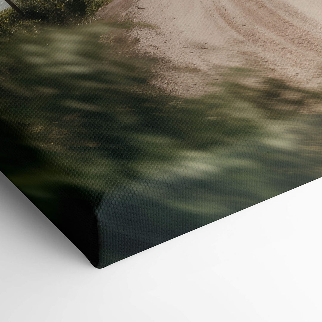 This close-up view of the corner of the canvas print highlights the skillful stretching and stapling techniques.