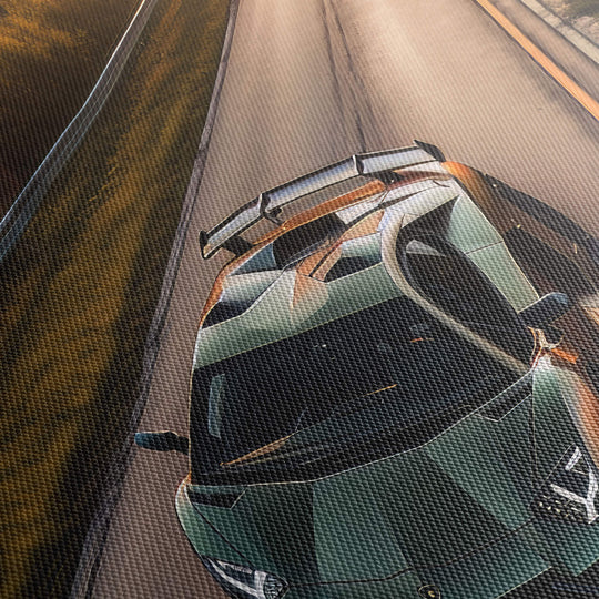 High-quality canvas print of a Green Lamborghini on a country road, with vivid colors and detailed texture.