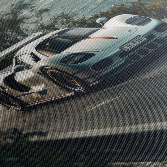 Close-up of silver Porsche 911 GT1 Strassenversion canvas print, showcasing texture and vivid colors.