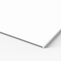 Edge of a 4mm white coroplast sheet showing the flutes