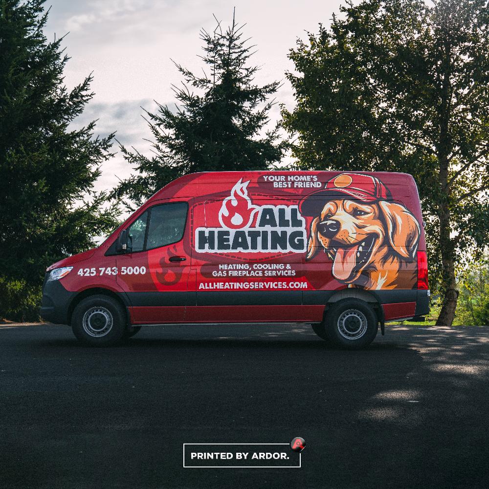 All Heating red van wrap featuring a friendly dog mascot, company logo, and contact details for heating, cooling, and fireplace services.