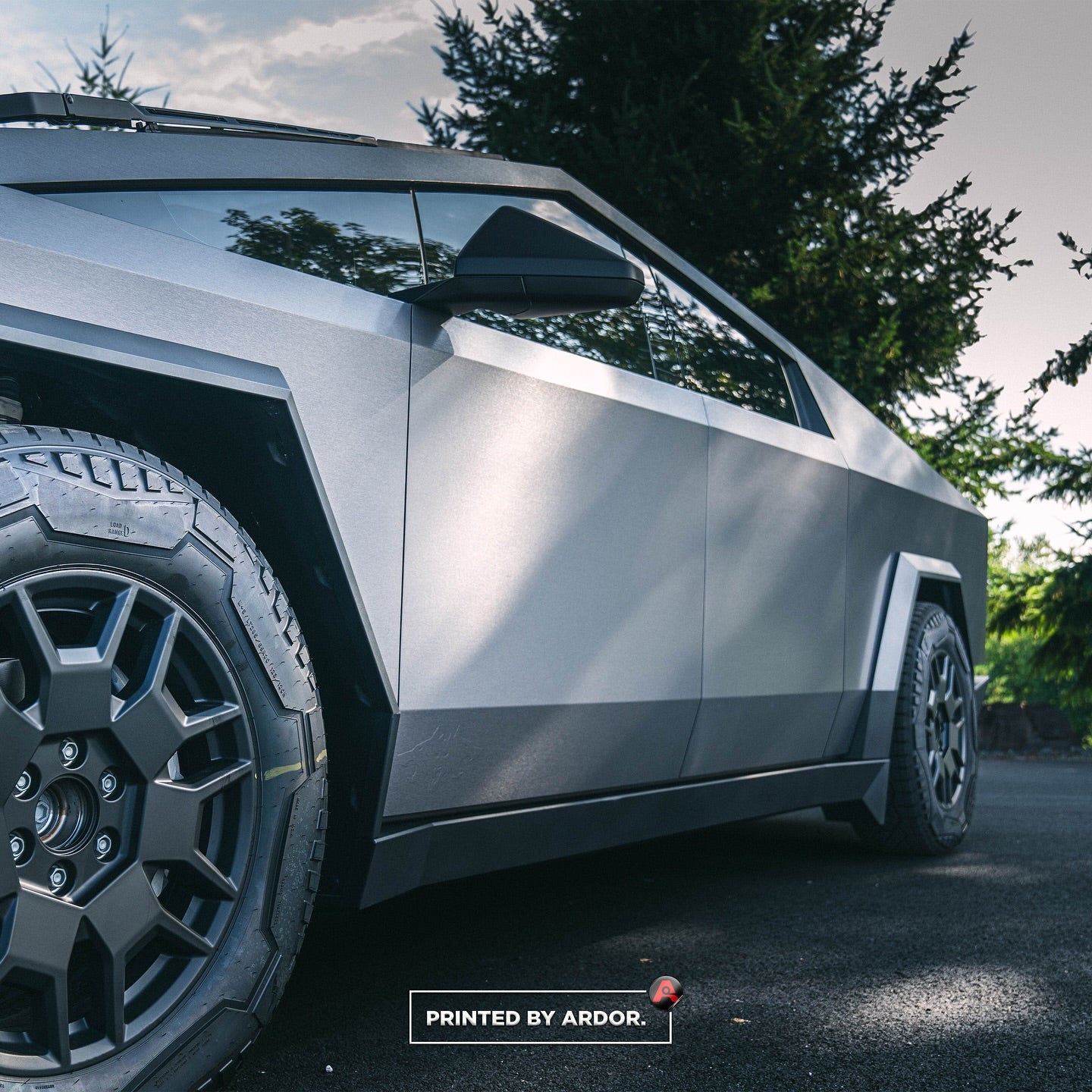 "Tesla Cybertruck with a digital urban camo wrap, combining modern tech aesthetics with a gritty feel."