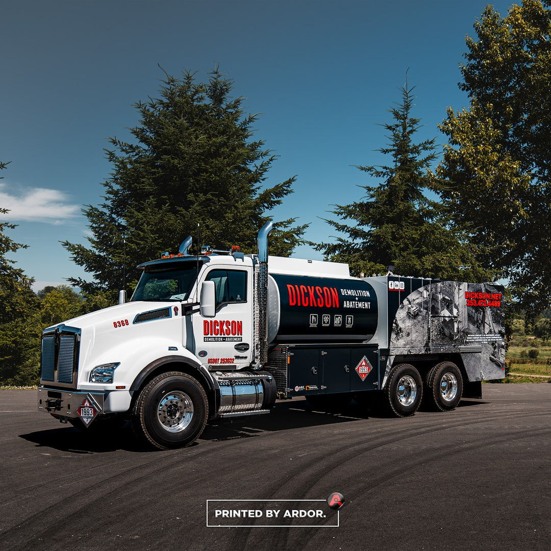 Front side view of Kenworth Truck Wrap with Dickson Demo Branding by Ardor Printing in Tacoma, WA