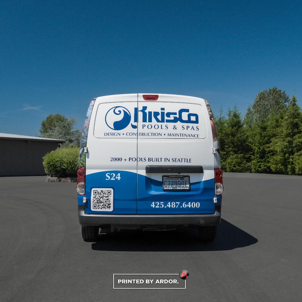 Rear of a KrisCo Pools & Spas van wrap displaying company branding, 2000+ pools built, QR code, S24 label, and phone number.