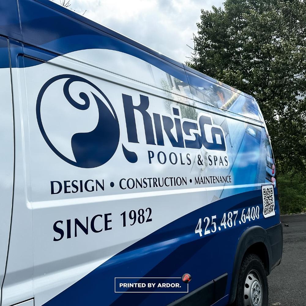 KrisCo Pools & Spas van wrap close-up, showcasing company services, logo, and contact details with 'Since 1982' text.