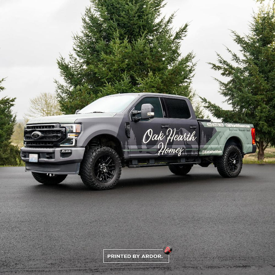 Gray Ford F-250 truck wrap with a script logo for Oak Hearth Homes