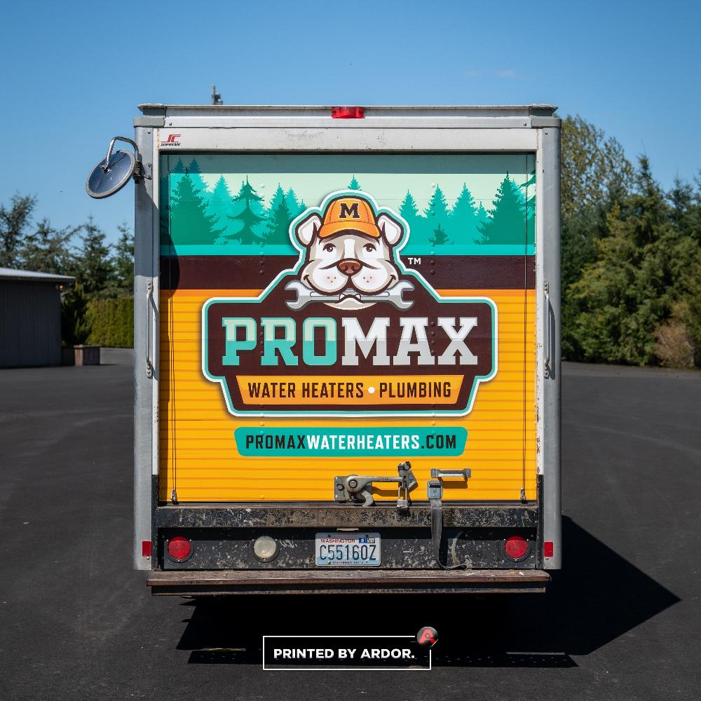 ProMax truck with a colorful rear wrap design, showcasing the company's bulldog mascot and service information for water heaters.