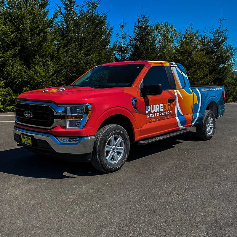 Full printed vinyl wrap we printed and installed for on this Ford F150 for PureDry Restoration in Snohomish, WA at Ardor Printing.
