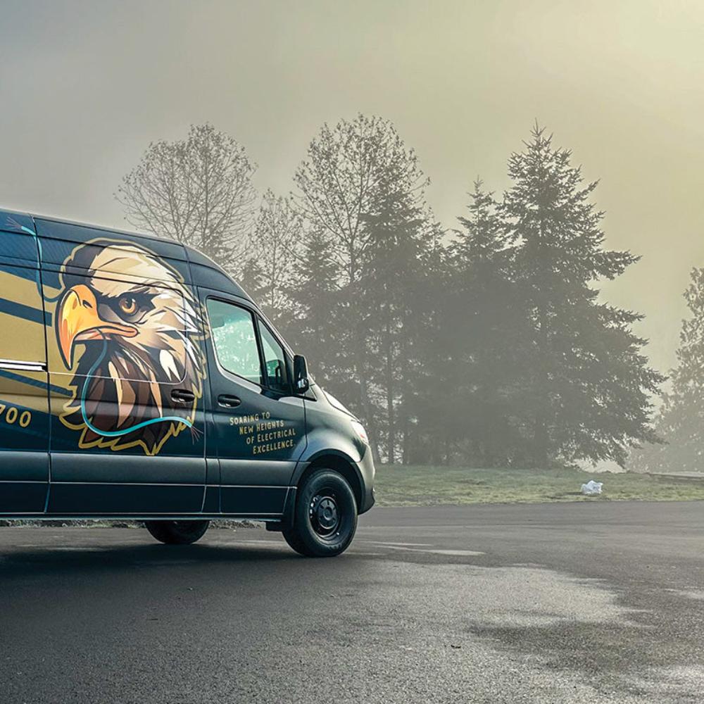 Sudden Electric's bold van wrap with a fierce eagle, symbolizing power and reliability, soaring to new heights of excellence!