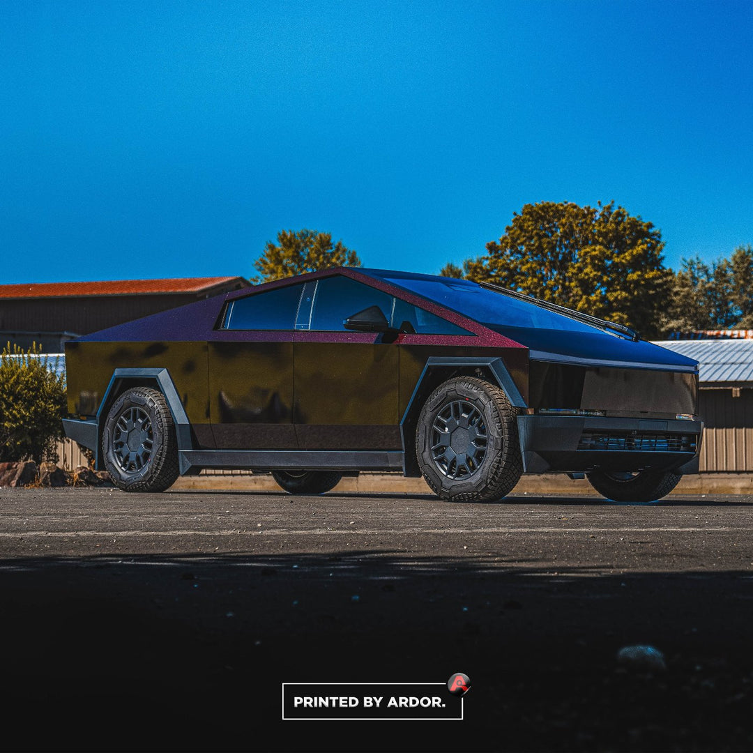 Full Wrap on a Tesla Cyber Truck in KPMF Black/Red Iridescent vinyl wrap film by Ardor Printing in Snohomish, WA