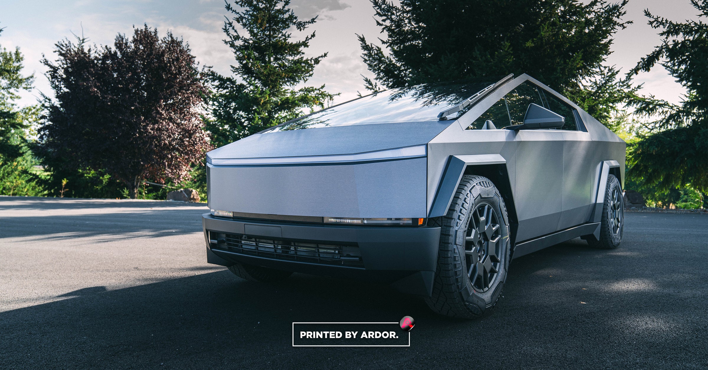 Tesla Cyber Truck with a 3M Brushed Steel Vinyl Car Wrap by Ardor Printing in Seattle, WA 