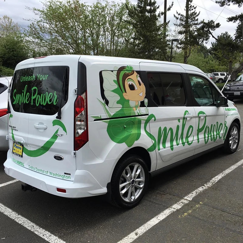 Large diecut vinyl graphics Ardor Printing made and installed on this Ford Transit for Delta Dental in Seattle, WA.