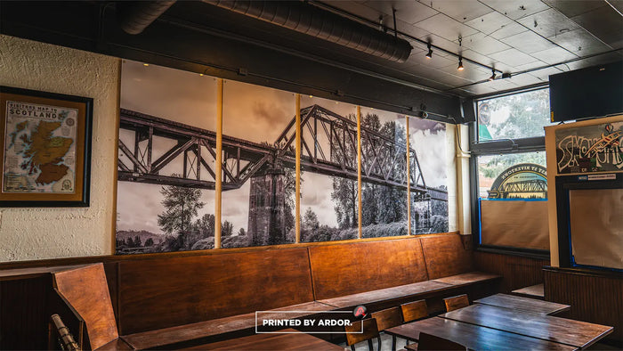 Acrylic wall graphics of a steel bridge in a restaurant
