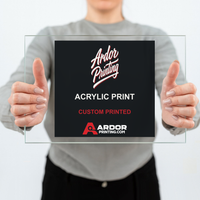 Custom clear acrylic print with spot white backing held up, clear acrylic around the art, Ardor Printing branding