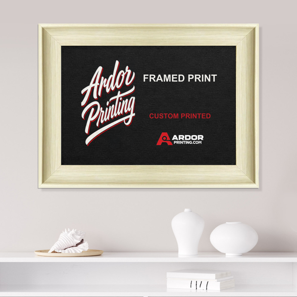 Custom framed print hanging on a wall above a shelf
