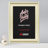Custom framed print in a natural wood style frame, portrait, standing on a table, Ardor Printing branding