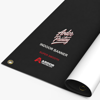 Custom indoor banner on super smooth vinyl printed with Ardor Printing branding, partly rolled with a grommet