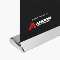 Close-up of the single sided deluxe retractable banner stand base holding the printed graphic, Ardor Printing branding