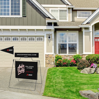 Real estate A-frame sign with a rider and pennant flag on a driveway in front of a house, Ardor Printing branding