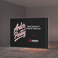 10ft SEG backlit popup display glowing in a dark room, Ardor Printing branding