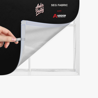 Close-up of the silicone edge fabric graphic being pulled from the 8ft SEG backlit popup display frame, Ardor Printing branding