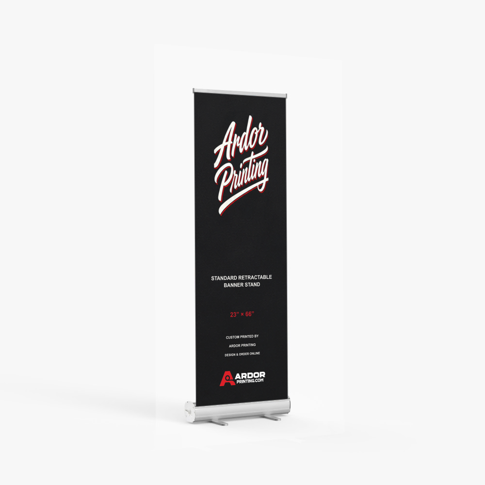Standard retractable banner stand, 23 x 66 in, silver base with a printed banner showing Ardor Printing branding