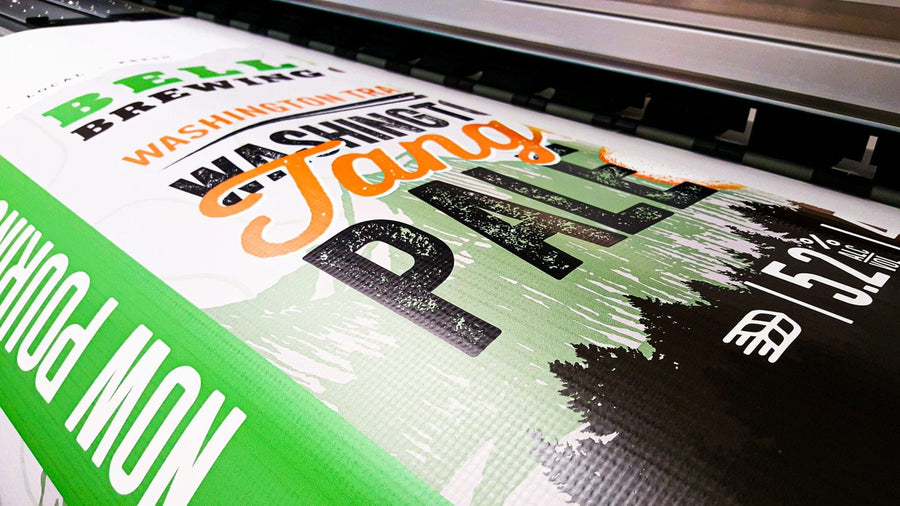 Bellevue Brewing Company vinyl banner coming off the printer at Ardor Printing