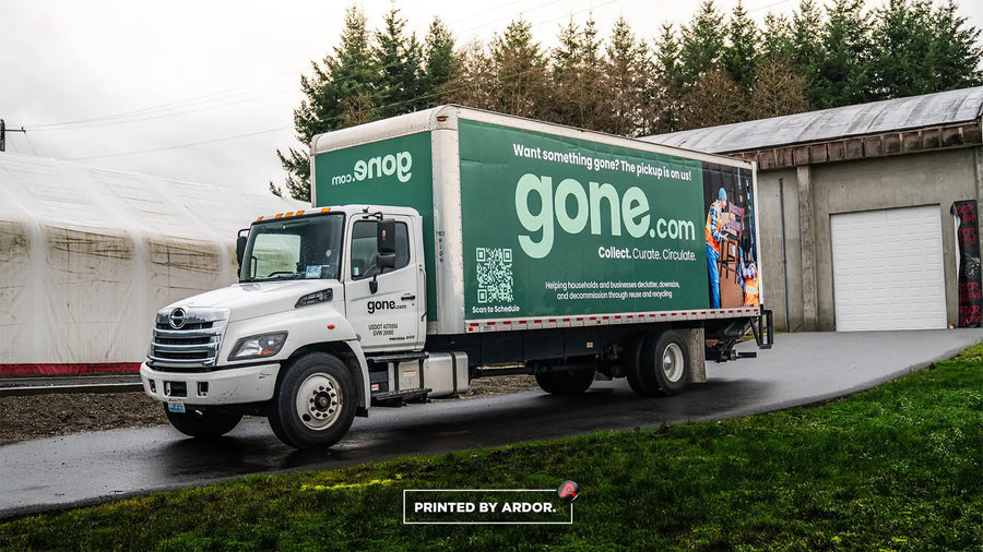 Full commercial box truck wrap for Gone.com on a green straight truck
