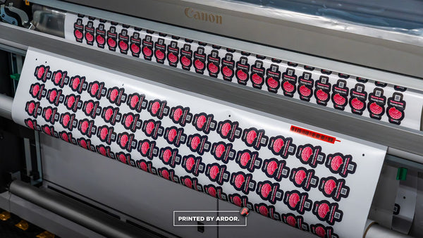 CaseIQ brain logo stickers printing on the Canon Colorado printer at Ardor Printing
