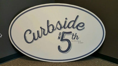 Curbside oval business sign by Ardor Printing